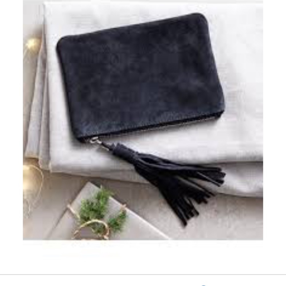 The White Company grey small suede clutch.